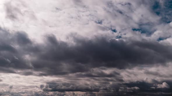 Timelapse of Gray Cumulus Clouds Moves in Blue Dramatic Sky Cirrus Cloud Space
