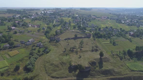 Aerial of a village and ruins