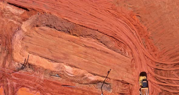 Aerial View of Large Construction Site with Several Crawler Excavator Machines in Moving Earth It