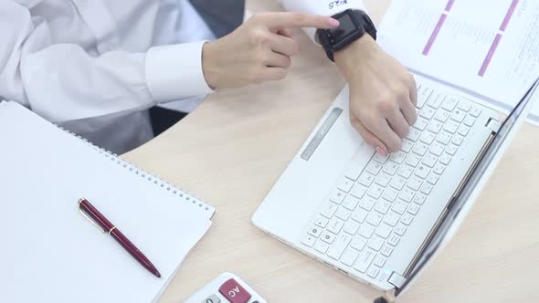 Business Woman Working In The Office And Using Laptop