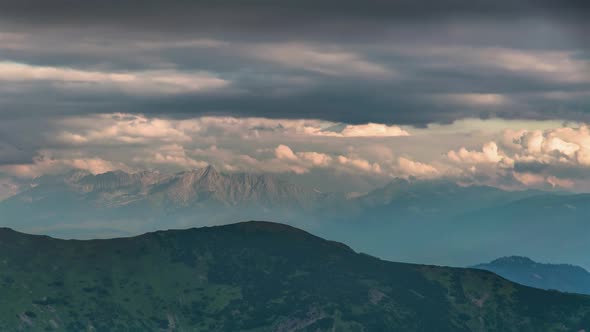 Grey Clouds Moving over Alpine Mountains