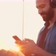 Young Arabian bearded Man chilling and smiling while the Walking Headphones. - VideoHive Item for Sale