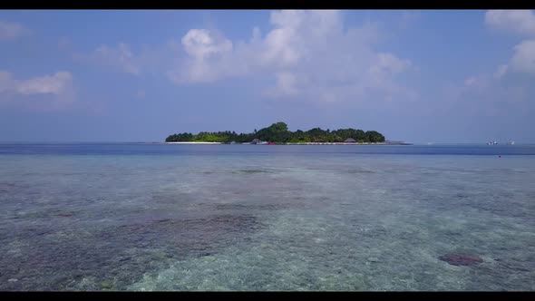 Aerial view panorama of idyllic coastline beach wildlife by blue ocean with white sand background of