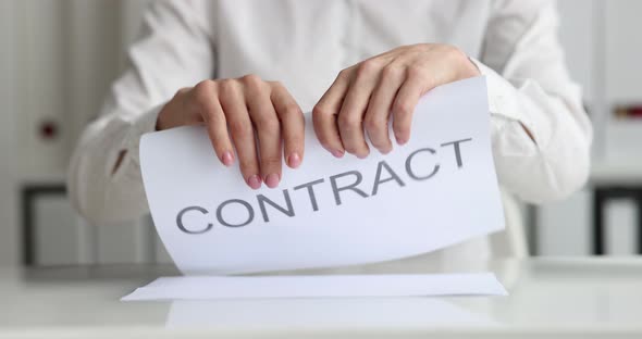 Woman Tearing Paper Contract in Office Closeup  Movie Slow Motion