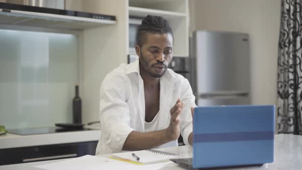 Portrait Confident Businessman Using Video Chat Kitchen Home