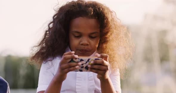 Portrait of a Teenager with a Smartphone