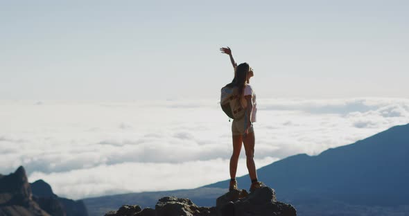 Adventurous woman at the top