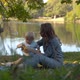 Mother and her son blowing soap bubbles - VideoHive Item for Sale
