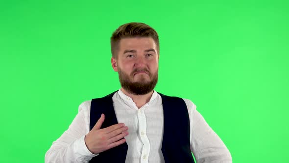 Man Is Proud of Himself, Showing His Hands That He's Good. Green Screen