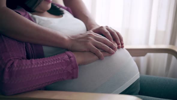 Pregnant Couple Feels Love and Relax at Home