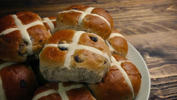 Passing Plate Of Hot Cross Buns On Table