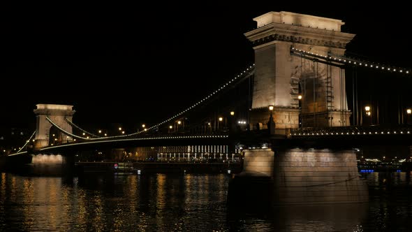 Szechenyi  Bridge in Budapest Hungary over river Danube 4K 2160p 30fps UltraHD footage - Lighted Cha