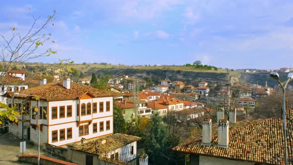 Old Houses And Sky On The Slope