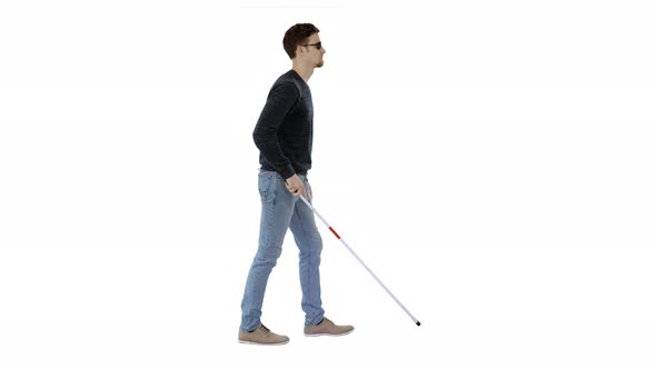 Blind Young Man with a Cane Walking on White Background