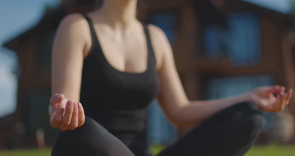 Close Up Yong Girl in Lotus Position