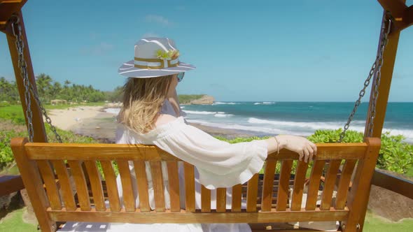 Romantic Summer Time Background Slow Motion Blonde Stylish Woman Wooden Swing