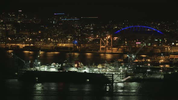 Port Of Seattle Ship Repair Cranes Downtown Skyline Cityscape Night Background