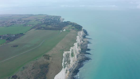 High Aerial dolly forward shot of the White cliffs of dover UK