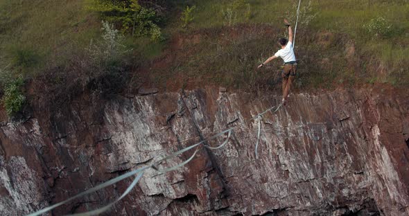 Slackline Is Shaking Under a Young Man Balancing on It Extreme Sports