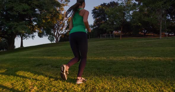 Athletic Woman Running Up A Hill Slow-Motion