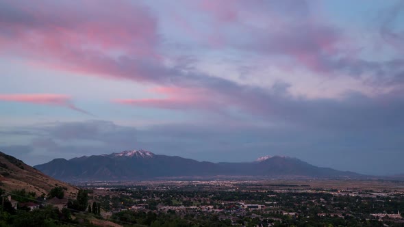 Colorful sunrise time lapse looking over Provo towards Spanish Fork