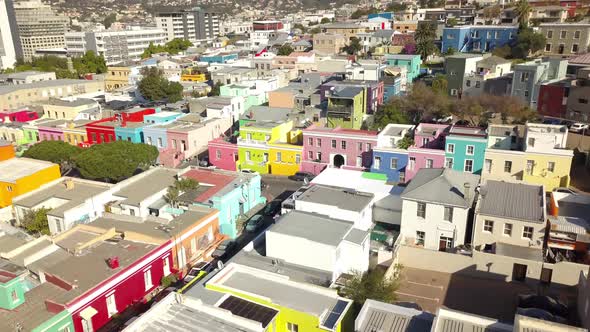 Aerial wide drone shot of Bokaap, Cape Town, South Africa, over Mosque Shafee at Chiapini and Wale S