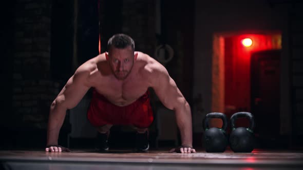 Tough Big Man in the Gym Doing Exercises - Doing Push Ups