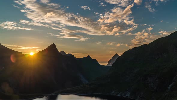 Timelapse of Sunset and Floating Clouds Above Norway Islands and Mountains