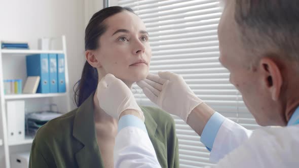 Doctor Examining Female Patient