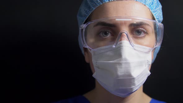 Doctor Holding Beaker with Coronavirus Blood Test