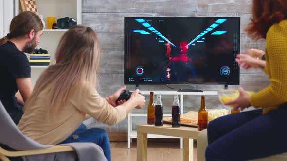 Back View of Game Over for Young Woman Playing Video Games