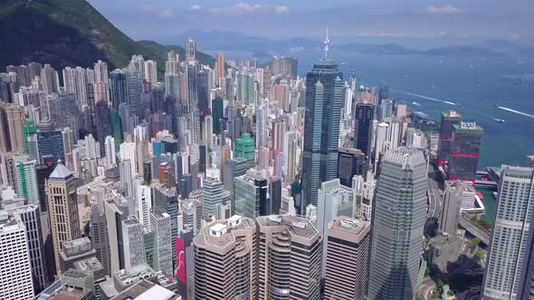 Drone fly down over the central district in Hong Kong city