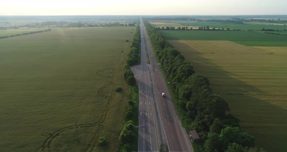 Highway Passes Between The Green Fields