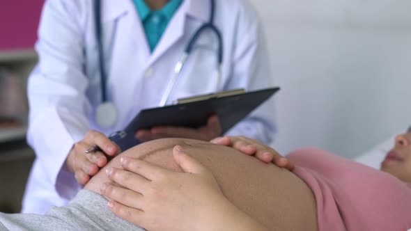 Pregnant Woman and Gynecologist Doctor at Hospital