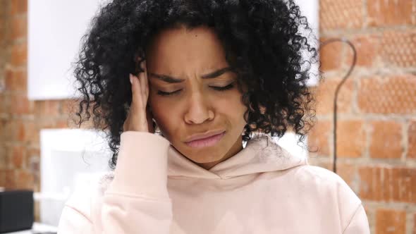 AfroAmerican Woman Gesturing Headache Stress