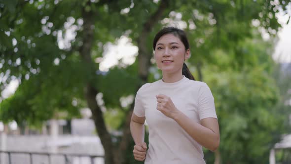 young woman running in the park