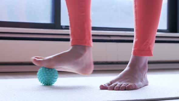 Low section of woman exercising with stress ball 4k