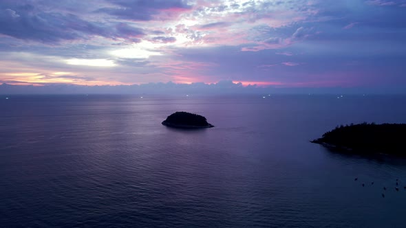 Purple Sunset with a View of the Sea and Clouds