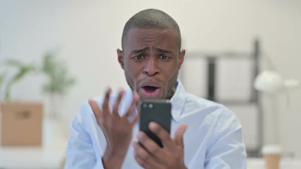 African Man Loss Smartphone Office