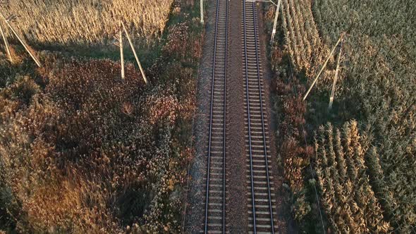 Aerial View of Railway Track Among Agricultural Fields