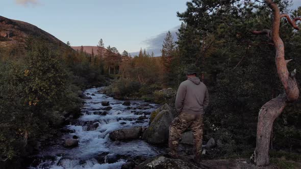 a Traveler Admires a Beautiful View of the Natural Landscape