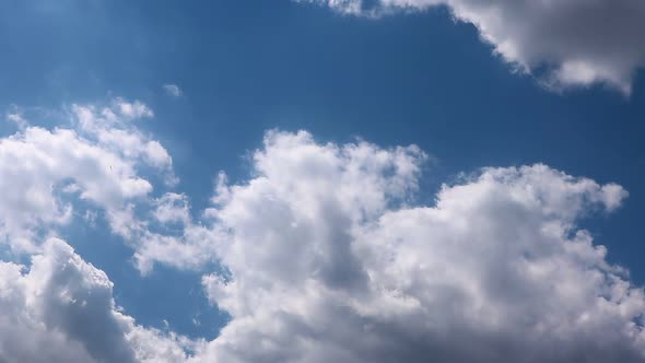 Timelapse summer clouds on blue sky