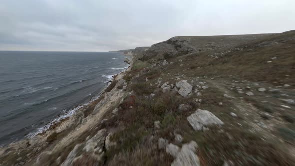 Dry Grass Fields and Ground Roads on Top of Shore Coastline on Fpv Drone