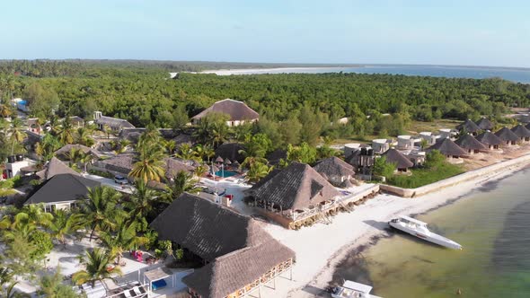 Paradise Coast Resort with Palm Trees and Hotels By Ocean Zanzibar Aerial View