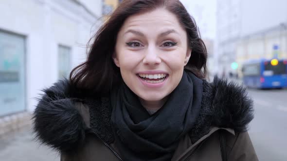 Hello Gesture By Young Woman on Street Outdoor