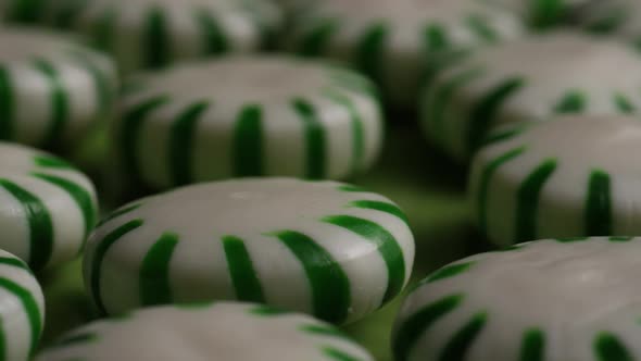 Rotating shot of spearmint hard candies - CANDY SPEARMINT 037