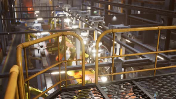Interior of Car Factory with a Production Line alt