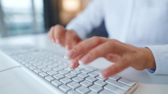 Female Hands Typing on a Computer Keyboard. Concept of Remote Work.