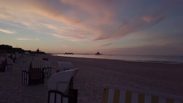 Pastel Sky with clouds over the beach at Sunset in 4K