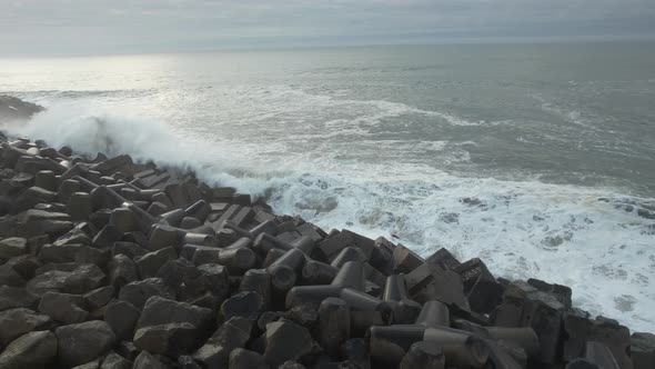 Ocean Waves Splash Against Reefs